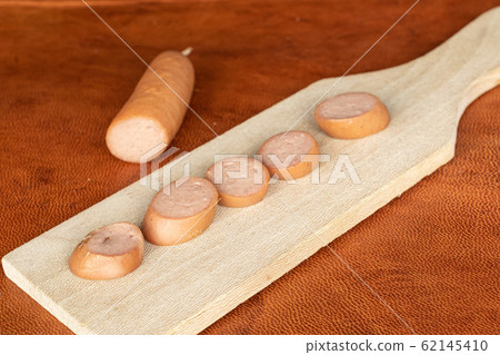 German pork sausage on cognac leather German pork sausage on cognac leather 62145410