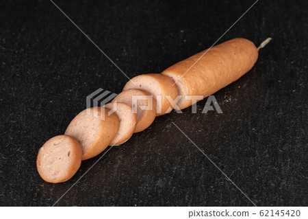 German pork sausage on grey stone German pork sausage on grey stone 62145420