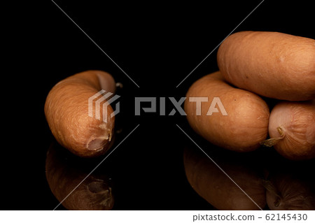 German pork sausage isolated on black glass German pork sausage isolated on black glass 62145430