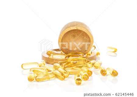 Golden fish oil isolated on white 62145446