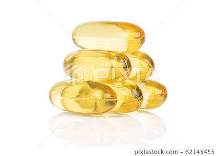 Golden fish oil isolated on white Golden fish oil isolated on white 62145455