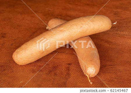 German pork sausage on cognac leather German pork sausage on cognac leather 62145467