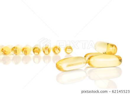 Golden fish oil isolated on white 62145523