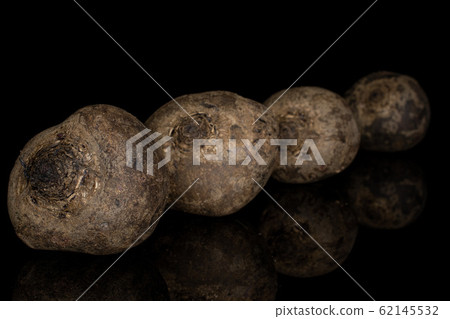 Raw sweet beetroot isolated on black glass 62145532