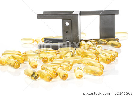 Golden fish oil isolated on white 62145565