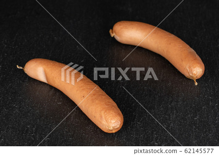 German pork sausage on grey stone 62145577
