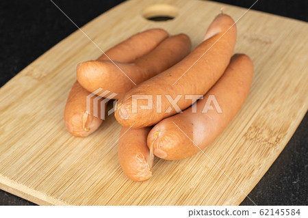 German pork sausage on grey stone 62145584