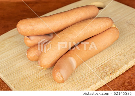 German pork sausage on cognac leather German pork sausage on cognac leather 62145585