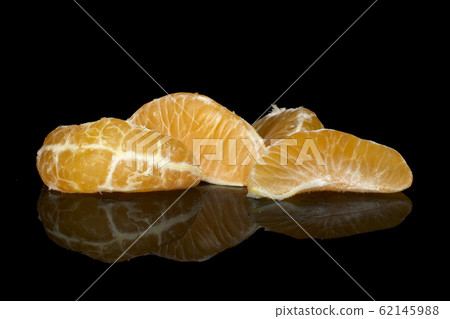 Fresh orange mandarin isolated on black glass Fresh orange mandarin isolated on black glass 62145988
