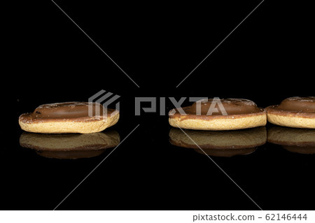 Chocolate biscuit isolated on black glass Chocolate biscuit isolated on black glass 62146444