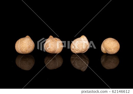 Fresh tan chickpea isolated on black glass 62146612