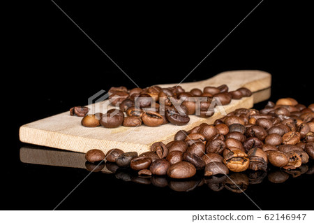 Fresh coffee bean isolated on black glass Fresh coffee bean isolated on black glass 62146947