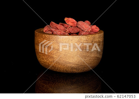 Red dried goji isolated on black glass Red dried goji isolated on black glass 62147053