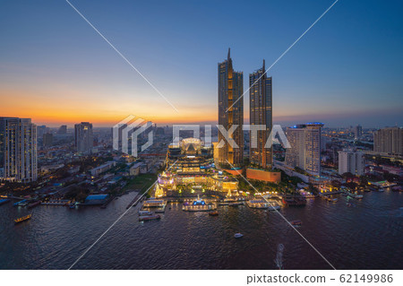 Aerial view of boats and Taksin Bridge with Chao Aerial view of boats and Taksin Bridge with Chao 62149986