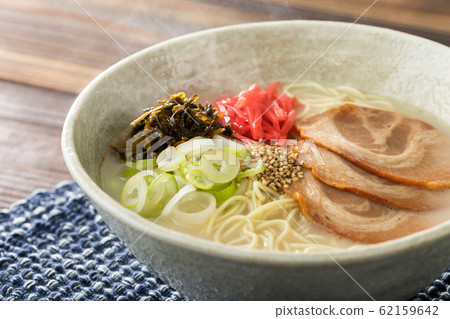 Up of hot pork bone ramen with warm steam Up of hot pork bone ramen with warm steam 62159642