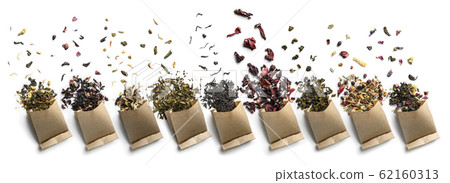 Large assortment of tea on a white background. The view from the top 62160313