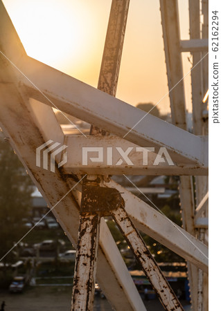 White steel structure on Sky at sunset White steel structure on Sky at sunset 62162294