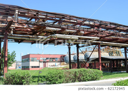 A large metallic iron pipeline trestle with pipes A large metallic iron pipeline trestle with pipes 62172945