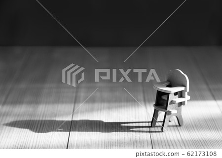 Empty chair for feeding children on a wooden Empty chair for feeding children on a wooden 62173108