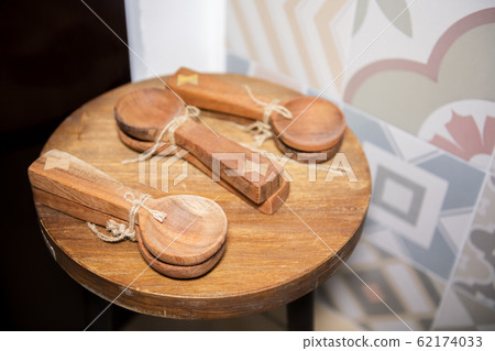 Hand made wooden spoons in a room, traditional souvenir of Puglia, Italy 62174033