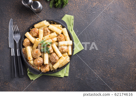 Pasta with meatballs in tomato sauce. Pasta with meatballs in tomato sauce. 62174616