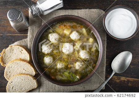 homemade meatball soup on the table 62174692