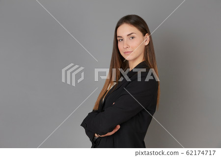 young businesswoman posing instudio background young businesswoman posing instudio background 62174717