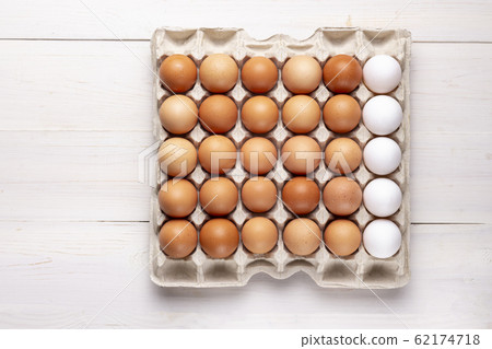chicken eggs in a tray chicken eggs in a tray 62174718
