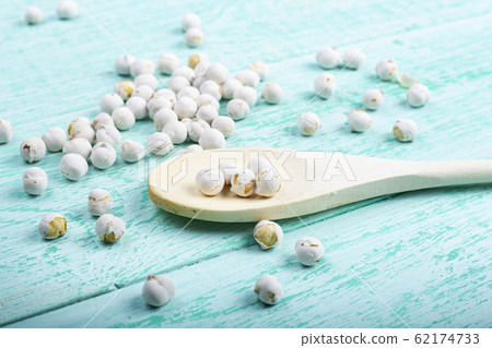 dry chickpeas on wooden background dry chickpeas on wooden background 62174733