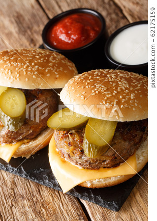 Hot fresh Oklahoma fried onion burgers served with Hot fresh Oklahoma fried onion burgers served with 62175159