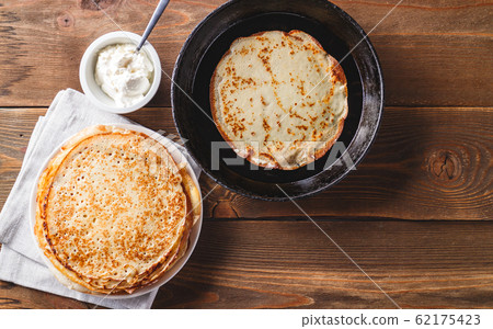 Stack of russian pancakes blini 62175423