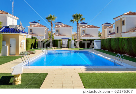 Modern residential houses with swimming pool 62176307