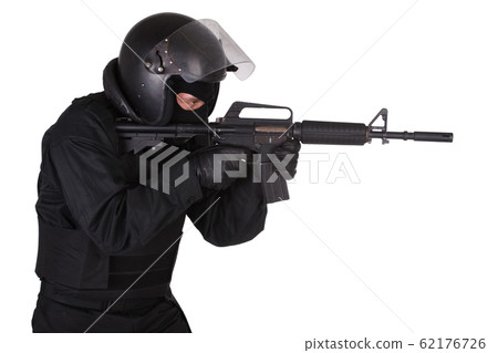Riot police officer in black uniform with assault Riot police officer in black uniform with assault 62176726