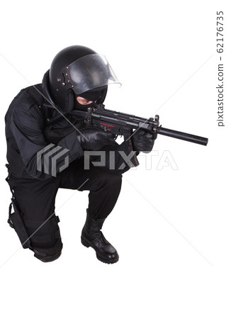 Riot police officer in black uniform with assault 62176735