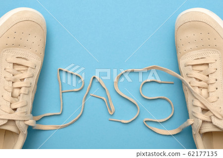 New women sneakers with laces in pass text. 62177135