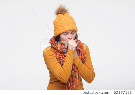 Sick caucasian woman in scarf and hat coughing...-照片素材（圖片