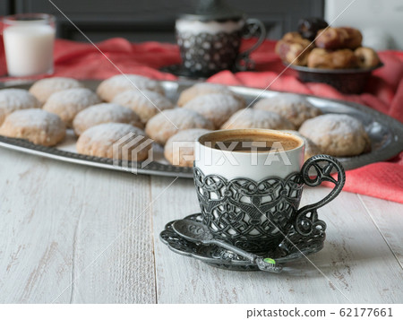Sweets and black coffee.  62177661