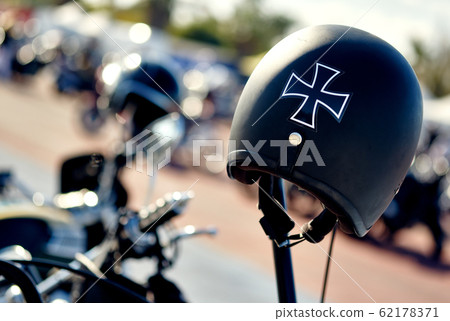 Black biker helmet with Maltese cross symbol 62178371