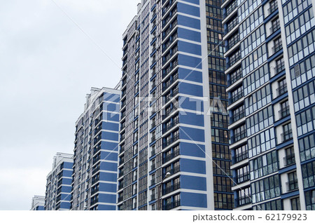 New modern tall blue glass multi-storey  62179923