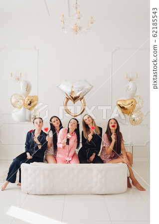 Girlfriends celebrating bachelorette party. Stock 62185543