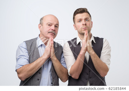 Please help us concept. Two caucasian men need a help asking for support. 62185844