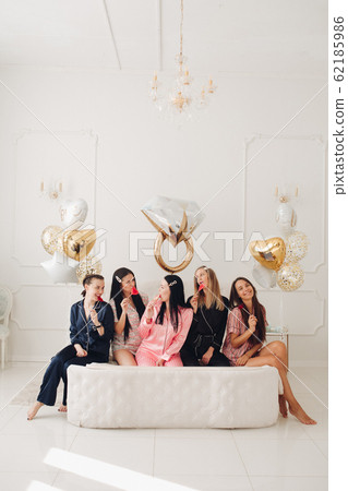 Girlfriends celebrating bachelorette party. Stock 62185986