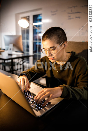 Productive office work in the evening stock photo Productive office work in the evening stock photo 62188823