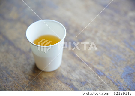Tea in paper cup Tea in paper cup 62189113