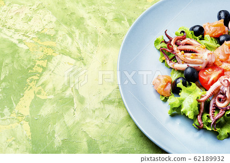Salad with squid and seafood Salad with squid and seafood 62189932