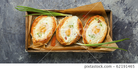 Homemade Adjarian khachapuri Homemade Adjarian khachapuri 62191465