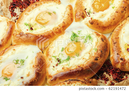 Adjarian Khachapuri with cheese Adjarian Khachapuri with cheese 62191472