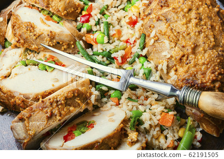 Baked meat and risotto 62191505