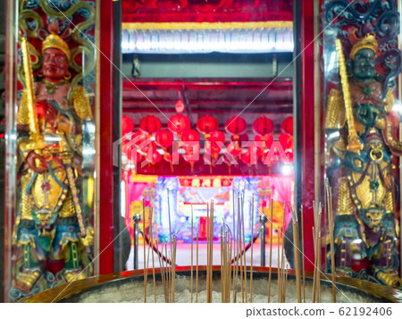 Burning incense in Chinese temple 62192406