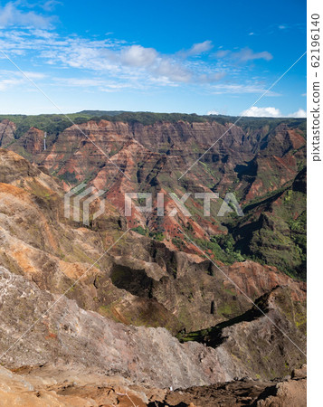 The rugged cliffs and canyons of Waimea Canyon, Kauai, Hawaii The rugged cliffs and canyons of Waimea Canyon, Kauai, Hawaii 62196140